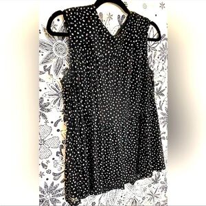 Juicy Couture black speckled sleeveless blouse, flowy peplum style